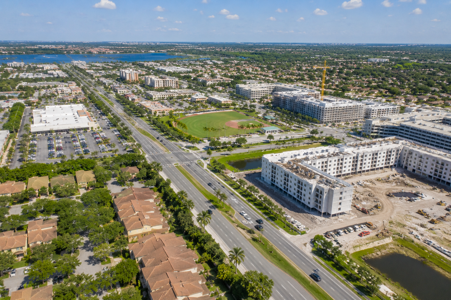Bright suburban expansion under clear skies